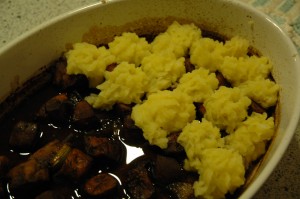 Mashed Vegetables on cooked Meat